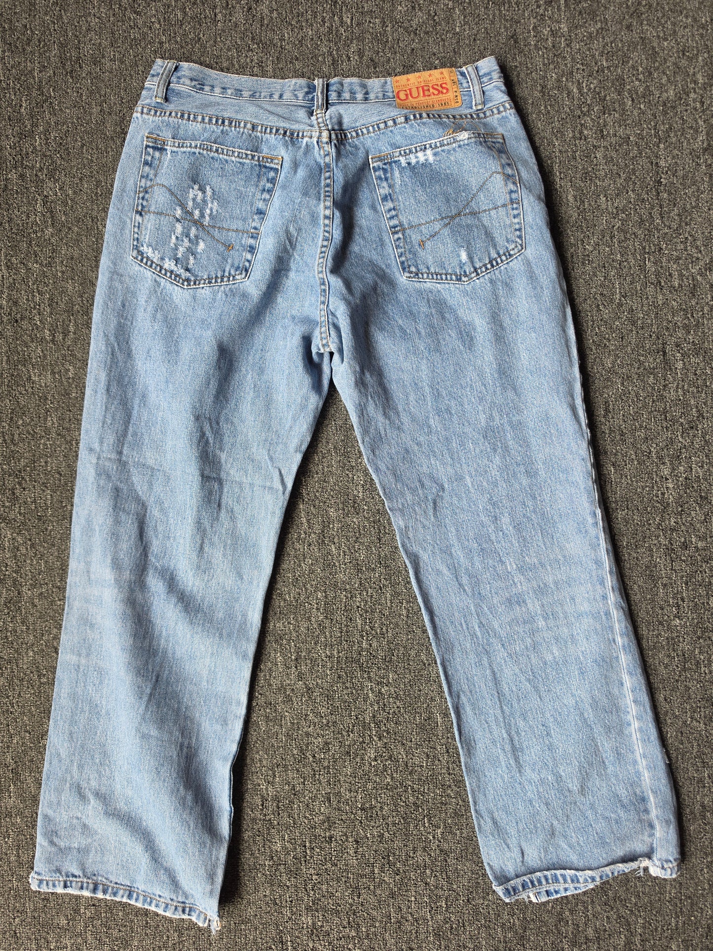 Guess Faded and Distressed Baggy Jeans (36/30)